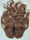 Close-up of Light Brown #6 Remy hair on lace base topper