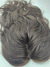Close-up of brunette Remy hair on lace base topper